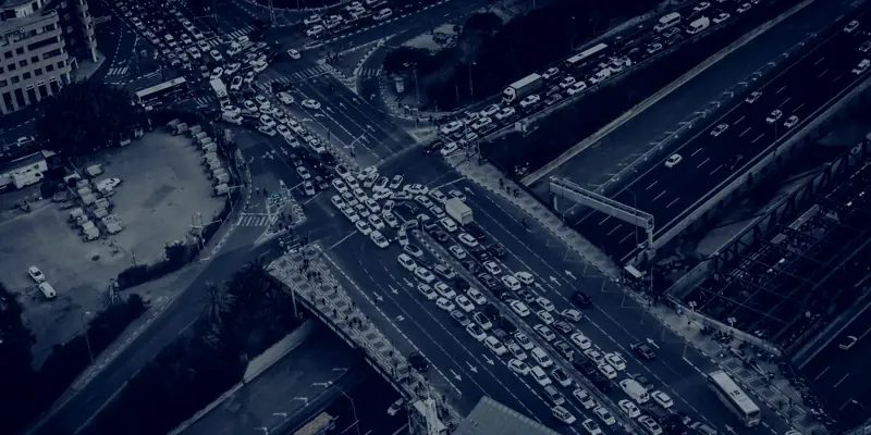 Aerial view of traffic backed up at a city intersection